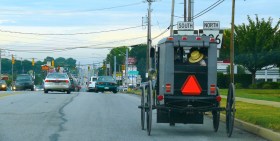 LAND OF EXTREMES A traditional Amish buggy makes its way into town (Photo: Ad Meskens).