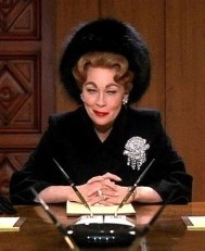 BOARDROOM BITCH Faye Dunaway as Joan Crawford in Mommie Dearest.
